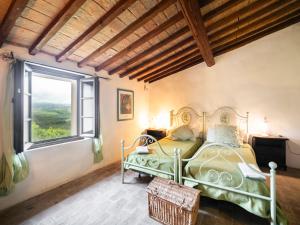 A bed or beds in a room at Holiday Home Vedi Torre by Interhome