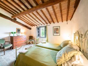 A bed or beds in a room at Holiday Home Vedi Torre by Interhome