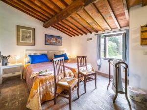 A bed or beds in a room at Holiday Home Vedi Torre by Interhome