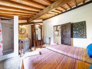 A bed or beds in a room at Holiday Home Vedi Torre by Interhome