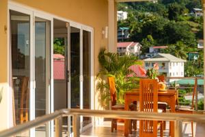 Balkón nebo terasa v ubytování Tropical Hideaway