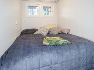 Ένα ή περισσότερα κρεβάτια σε δωμάτιο στο Holiday Home Piitterin saunatupa by Interhome +14 φωτογραφίες