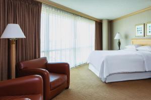 Postel nebo postele na pokoji v ubytování Sheraton Atlantic City Convention Center Hotel + 27 fotografií