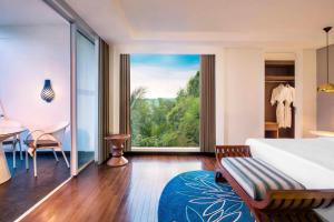 Postel nebo postele na pokoji v ubytování Le Meridien Bali Jimbaran