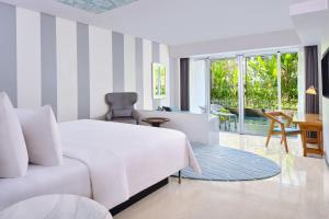 TV a/nebo společenská místnost v ubytování Le Meridien Bali Jimbaran