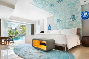 Postel nebo postele na pokoji v ubytování Le Meridien Bali Jimbaran