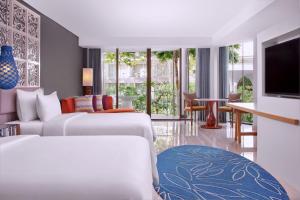 TV a/nebo společenská místnost v ubytování Le Meridien Bali Jimbaran