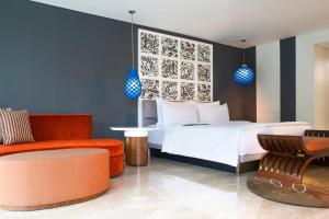Postel nebo postele na pokoji v ubytování Le Meridien Bali Jimbaran