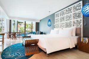 Postel nebo postele na pokoji v ubytování Le Meridien Bali Jimbaran
