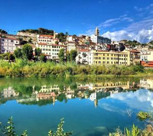 a view of a city from the river at Casa Primavera in Ventimiglia