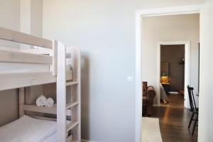 Postel nebo postele na pokoji v ubytování Fosshotel Baron