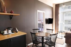 TV a/nebo společenská místnost v ubytování Fosshotel Baron