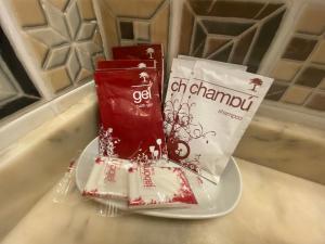 a packet of chandanachi on a plate on a counter at Pensión Coral in Barcelona