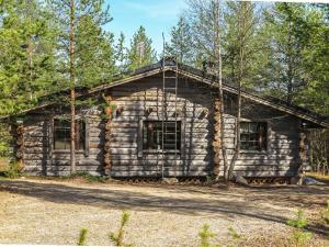 an old log cabin in the woods at Holiday Home Kulpakko 3 by Interhome in Tiainen