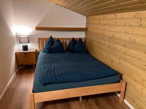 Ein Bett oder Betten in einem Zimmer der Unterkunft Apartment Top 49A by Interhome