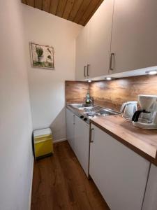 Küche/Küchenzeile in der Unterkunft Apartment Top 49A by Interhome