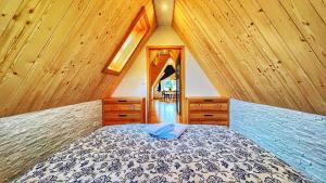 Posteľ alebo postele v izbe v ubytovaní Apartament Podwika