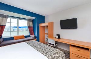 Katil atau katil-katil dalam bilik di Microtel Inn and Suites by Wyndham - Cordova