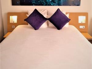 Postel nebo postele na pokoji v ubytování Novotel Antwerpen - Ekeren + 37 fotografií