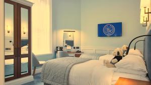 Letto o letti in una camera di Wynn's Hotel