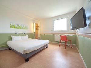 Postel nebo postele na pokoji v ubytování Ibis Budget Sarrebourg Buhl + 37 fotografií