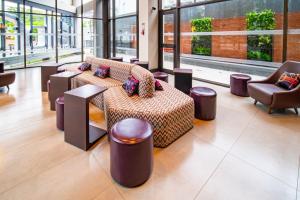 Гостиная зона в Aloft Asuncion