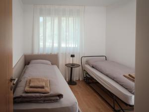 Letto o letti in una camera di Apartment Davinci-2 by Interhome
