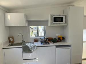 Kuchyň nebo kuchyňský kout v ubytování Camping Platja Cambrils