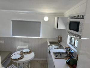 Kuchyň nebo kuchyňský kout v ubytování Camping Platja Cambrils
