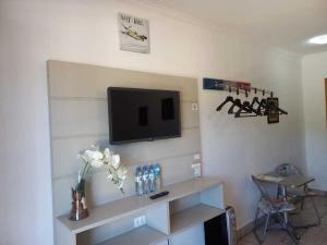 TV a/nebo společenská místnost v ubytování Casarão da Ducha hotel concept