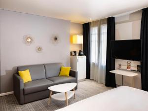 Postel nebo postele na pokoji v ubytování Mercure Nice Centre Grimaldi