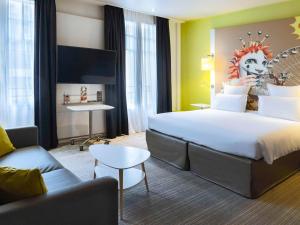 Postel nebo postele na pokoji v ubytování Mercure Nice Centre Grimaldi