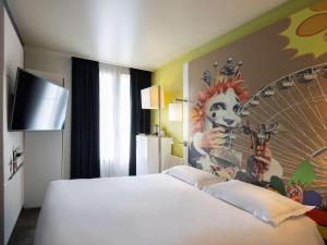 Postel nebo postele na pokoji v ubytování Mercure Nice Centre Grimaldi