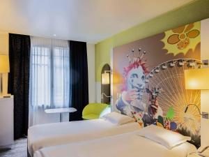 Postel nebo postele na pokoji v ubytování Mercure Nice Centre Grimaldi