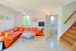 Et tv og/eller underholdning på Ferienhaus Meer