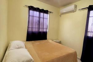 Postel nebo postele na pokoji v ubytování Tranquilo y cómodo apartamento