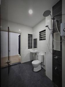 a bathroom with a toilet and a sink at H+M Residence II [3km] to Setia City Convention in Klang