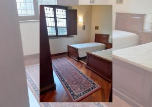 two photos of a bedroom with two beds and a rug at Condominio Pisella in Pieve di Panzano