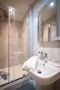 a bathroom with a sink and a shower at Ambleside Fell Rooms in Ambleside +35 photos