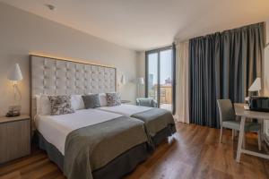 Posteľ alebo postele v izbe v ubytovaní Gran Hotel Havana 4Sup by Escampa Hotels