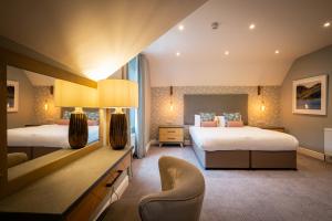 Giường trong phòng chung tại Ambleside Fell Rooms