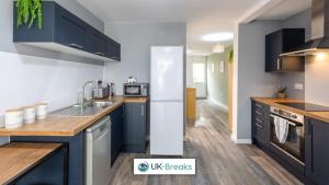 A cozinha ou cozinha compacta de Beautiful modern 1 bedroom apartment Fast Wi-fi 24hr check-in Pet friendly