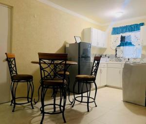 Kuchyň nebo kuchyňský kout v ubytování Kenridge Residences