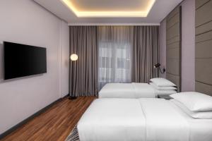 Four Points by Sheraton Lagosにあるベッド