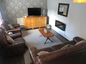 אזור ישיבה ב-Extensive 4 bed close to Peterborough