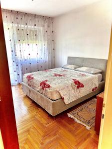 מיטה או מיטות בחדר ב-Appartamento Vacanze