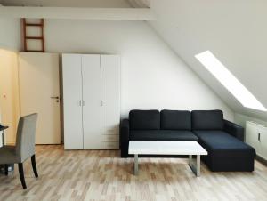 Posezení v ubytování (id024) Østergade 87. 1 tv + 2 fotografie