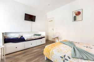 Posteľ alebo postele v izbe v ubytovaní Grande maison 12Personnes 4CH-2SDB - Êxterieur -proche Lille