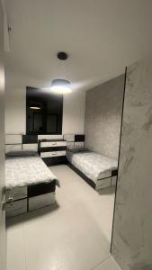 מיטה או מיטות בחדר ב-Apartment in Akko with Sea View