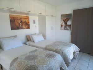 Katil atau katil-katil dalam bilik di Come Home in Oudtshoorn Self-Catering Units